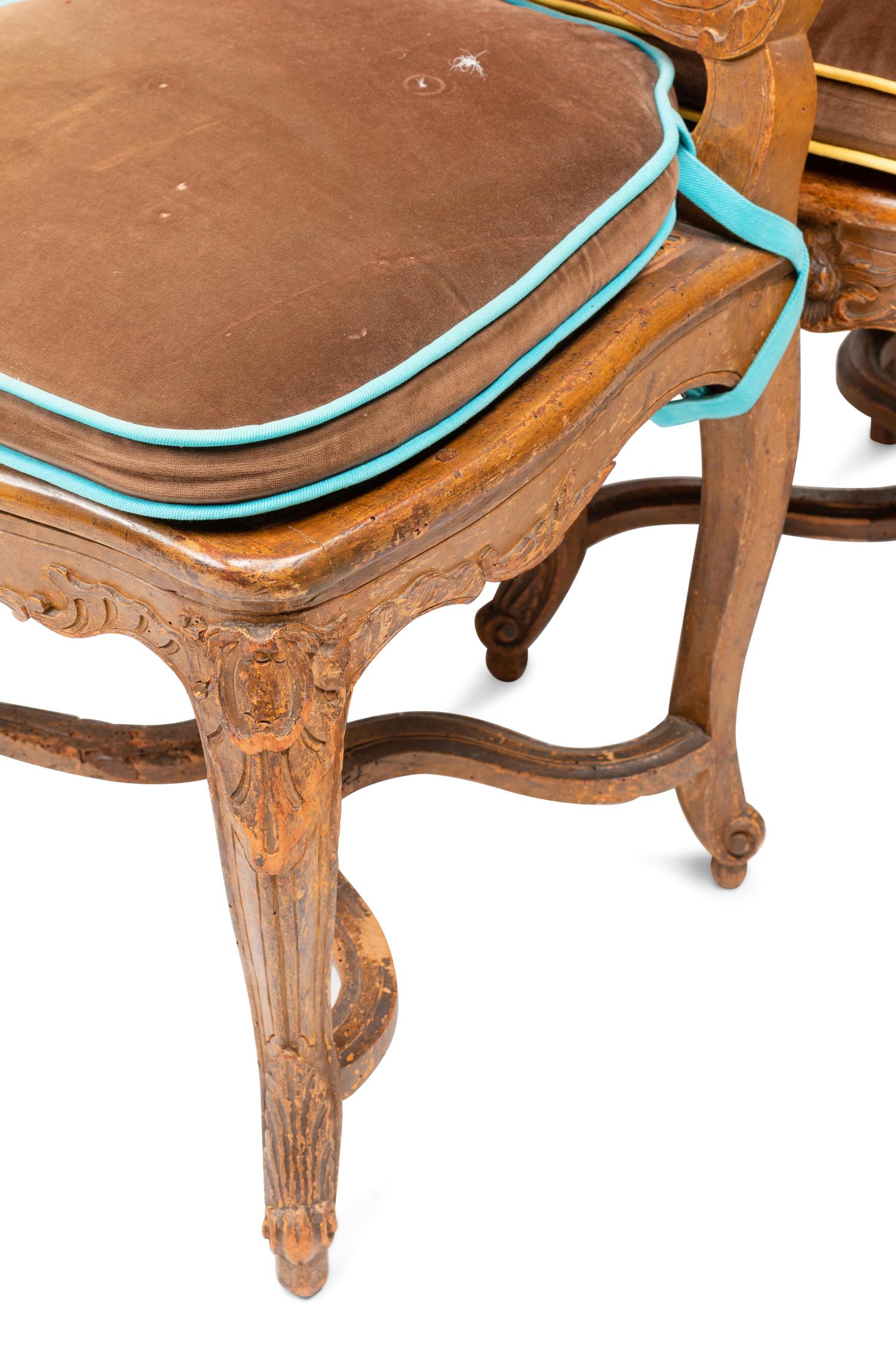 A Set of Eight Louis XV Provincial Style Dining Chairs