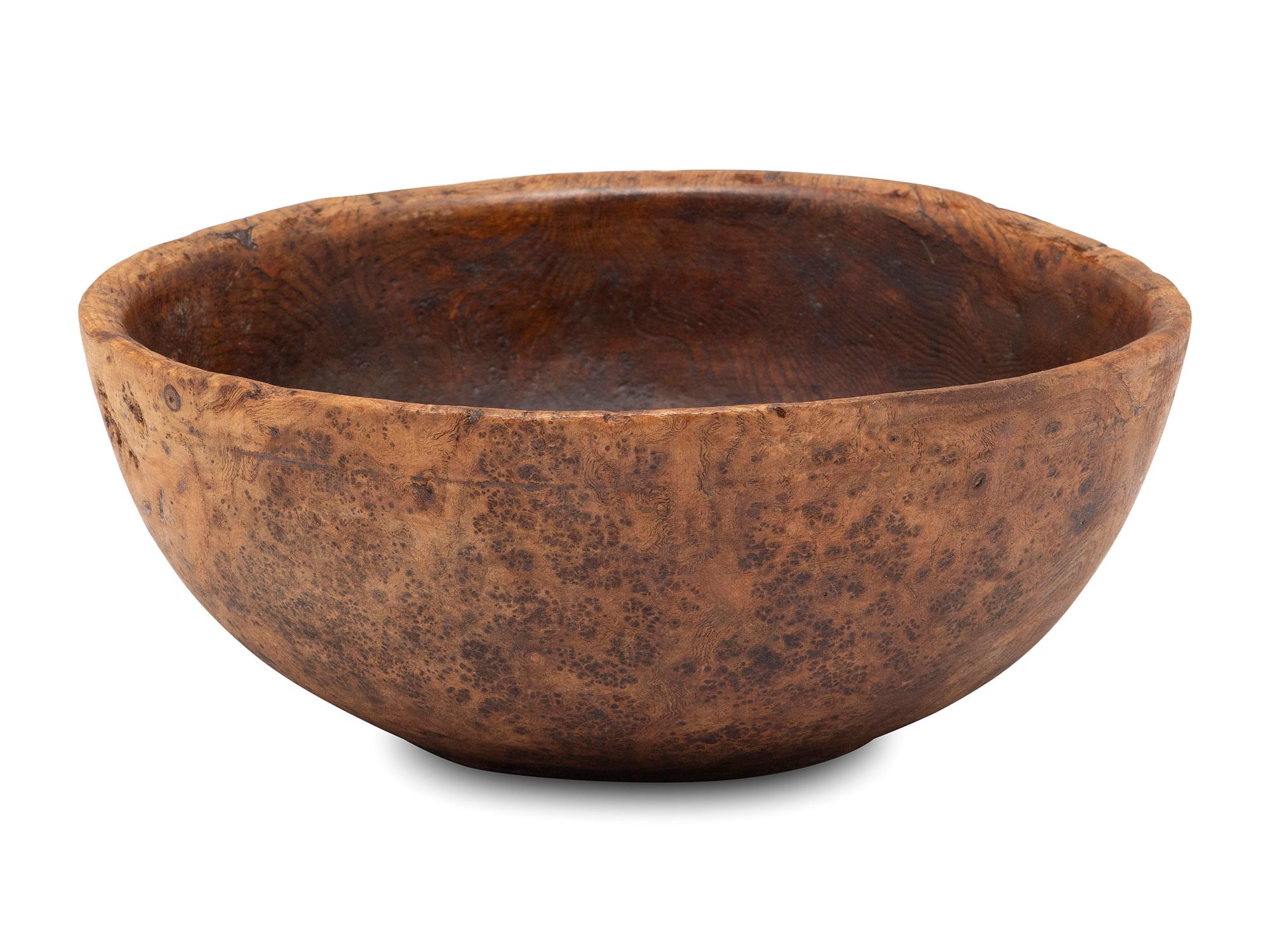 A Carved Burlwood Dough Bowl