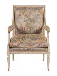 A Louis XVI Carved and White-Painted Fauteuil