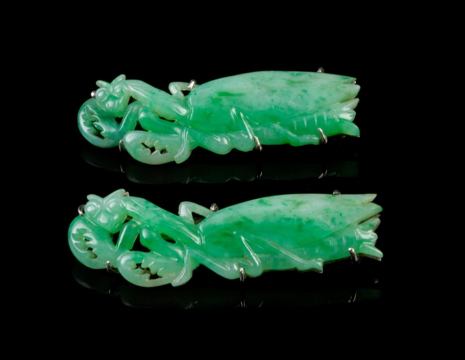 A Pair of Chinese Silver and Jadeite Brooches Length 2 inches.