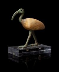 An Egyptian Bronze and Alabaster Ibis Height 5 1/2 inches. — THIRD INTERMEDIATE PERIOD, DYNASTY 21-22, 1070-712 B.C.E.