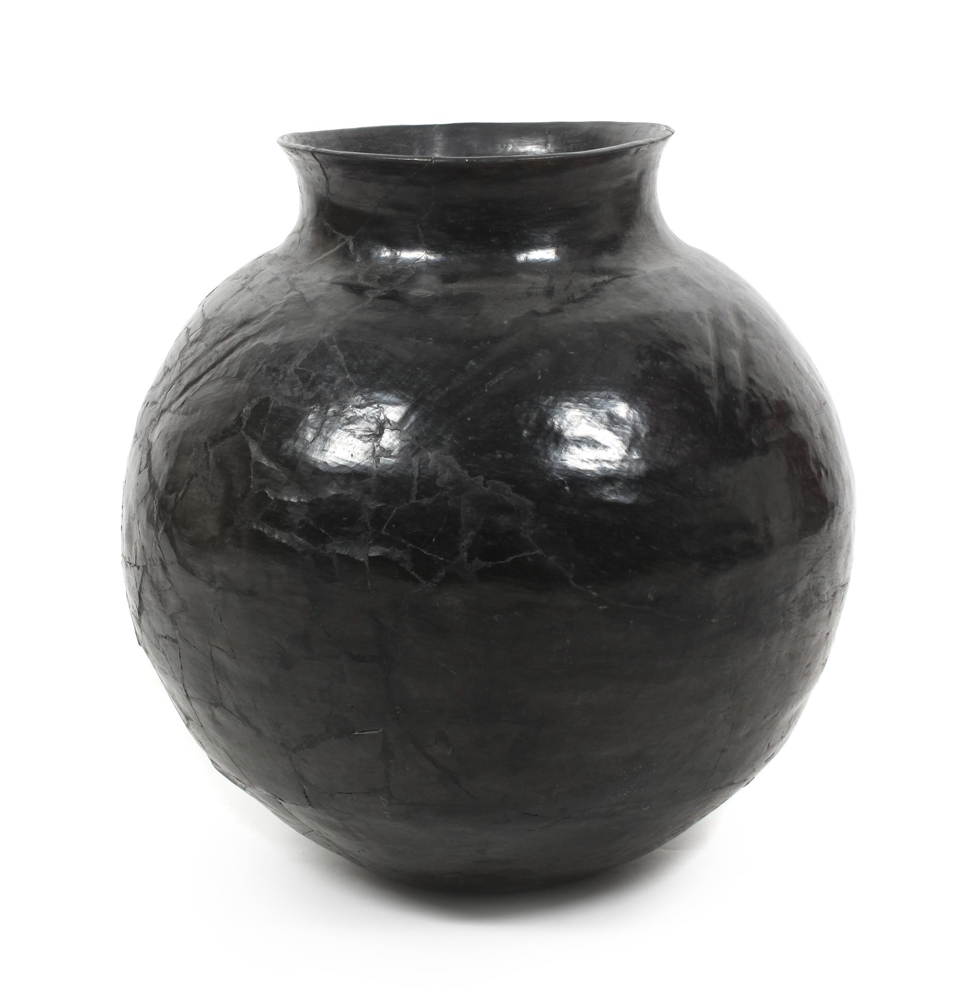 A Santa Clara Blackware Pottery Jar Height 19 x diameter 15 inches. — LATE 19TH/ EARLY 20TH CENTURY
