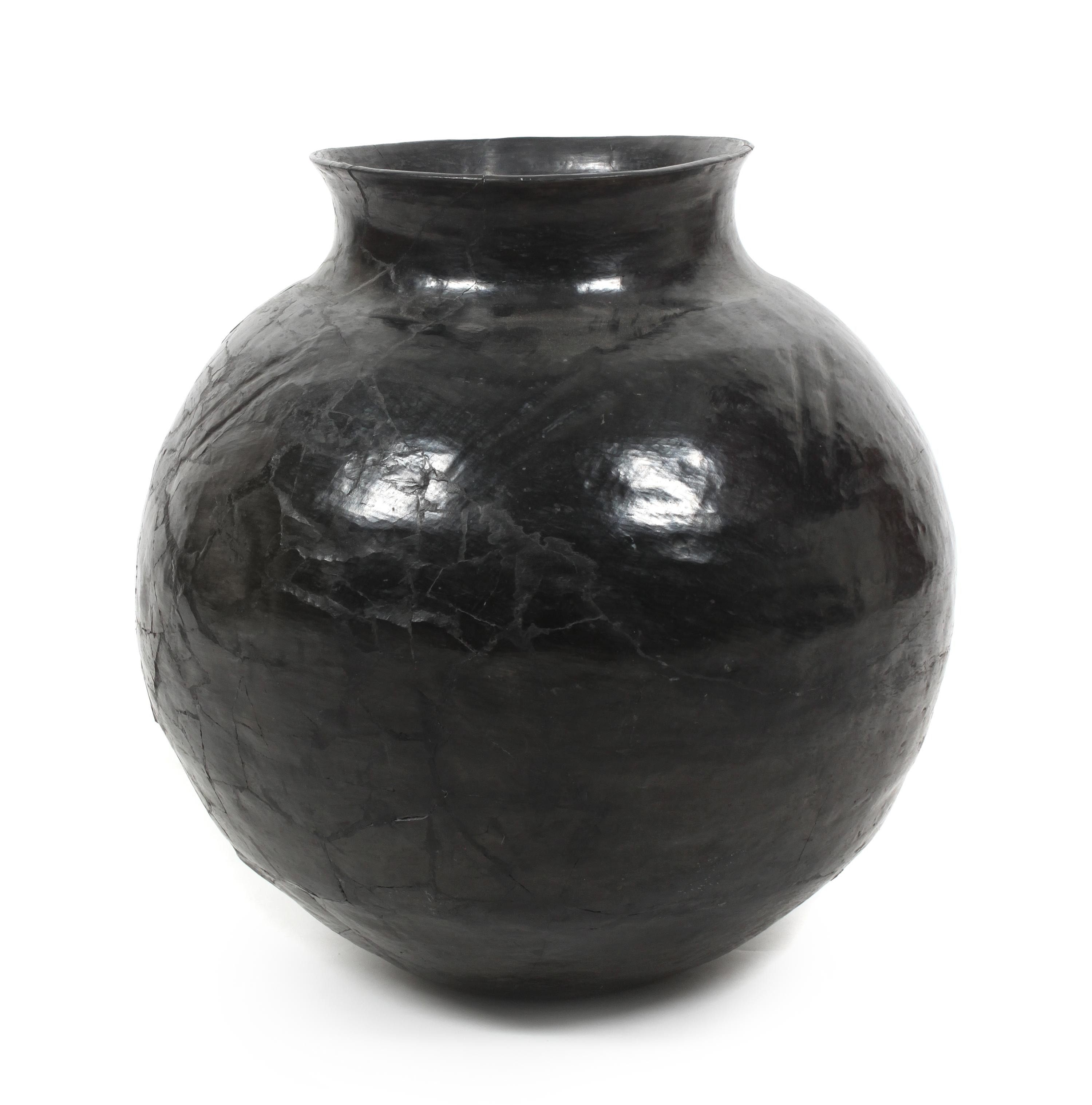 A Santa Clara Blackware Pottery Jar Height 19 x diameter 15 inches. — LATE 19TH/ EARLY 20TH CENTURY