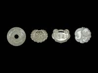 Four Chinese White Jade Pendants