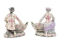 A Pair of Dresden Porcelain Figural Sweetmeat Dishes