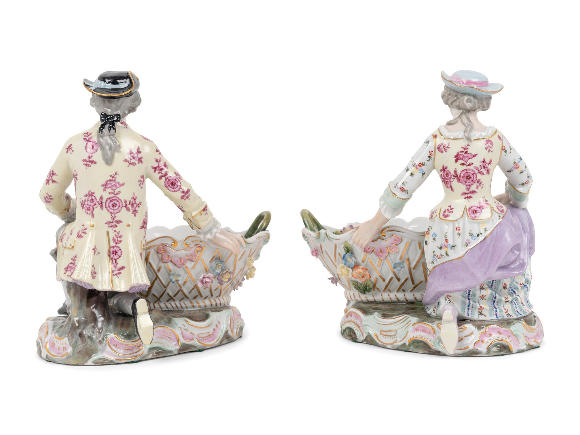 A Pair of Dresden Porcelain Figural Sweetmeat Dishes