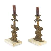 A Pair of Gilt Metal Candlesticks