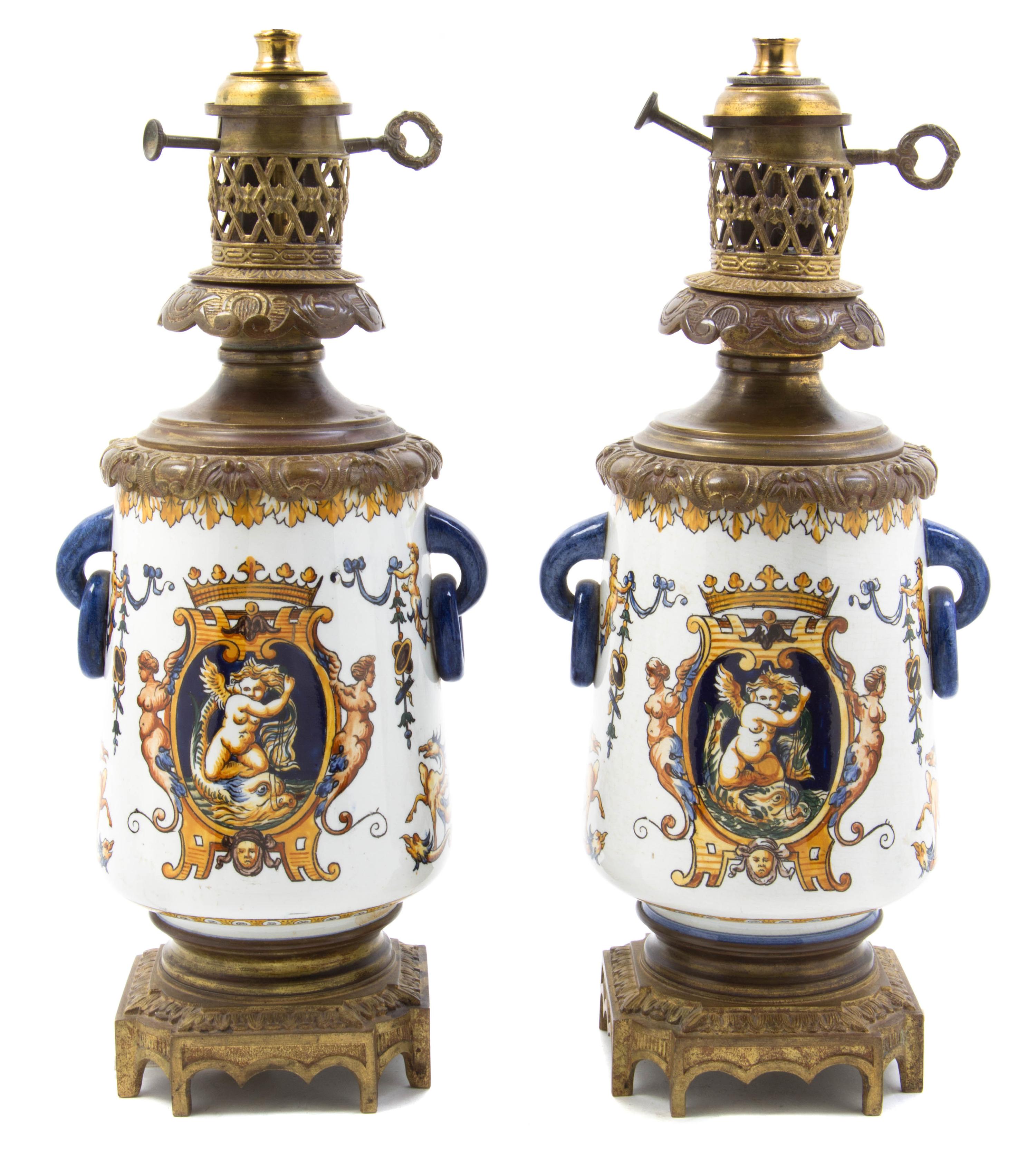 A Pair of French Faience Lamps, Height 12 inches.