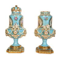 A Pair of Sèvres Style Porcelain Urns
