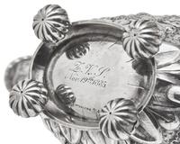 An Assembled American Eight-Piece Repoussé Silver Tea and Coffee Service