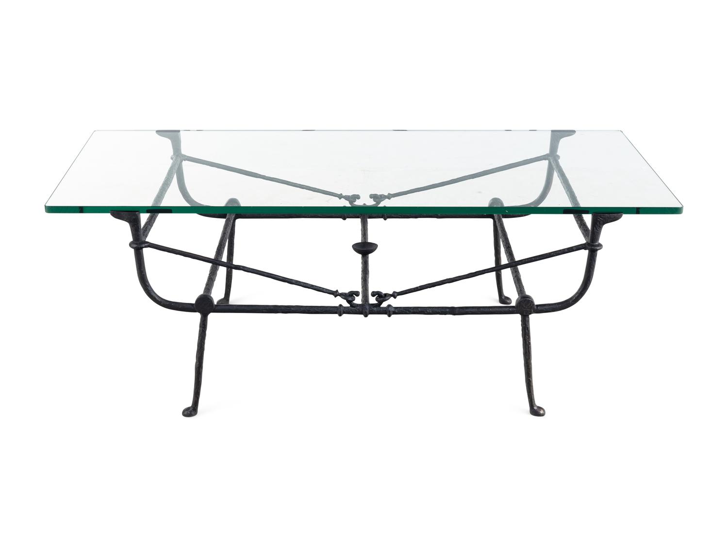 A Cast Iron and Glass Low Table in the Style of Giacometti