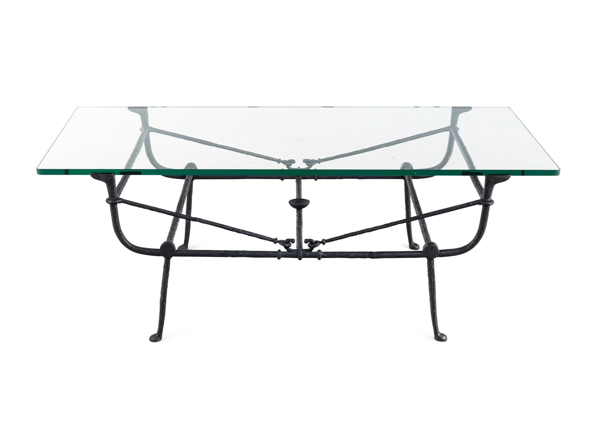 A Cast Iron and Glass Low Table in the Style of Giacometti