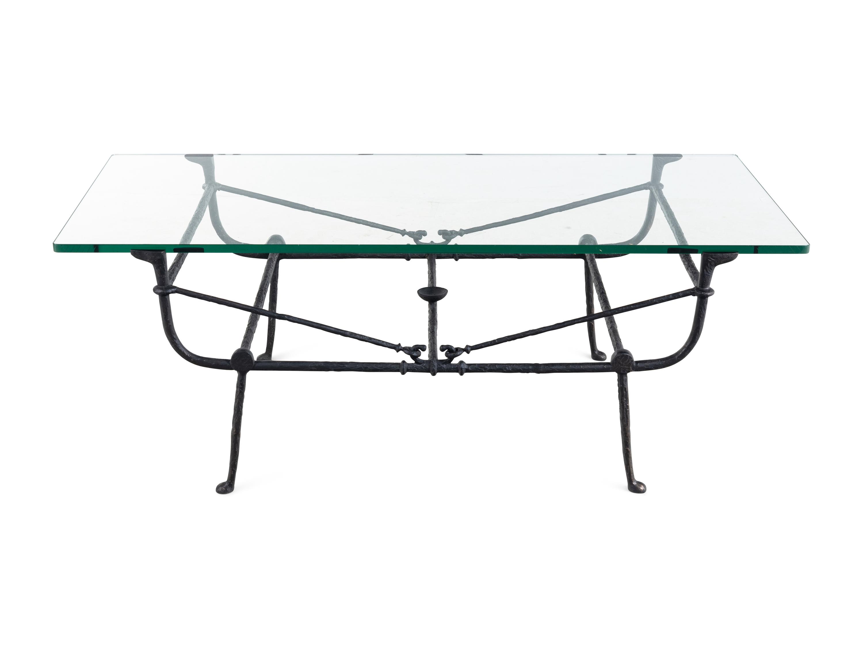 A Cast Iron and Glass Low Table in the Style of Giacometti
