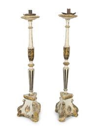 A Pair of Continental Painted Prickets