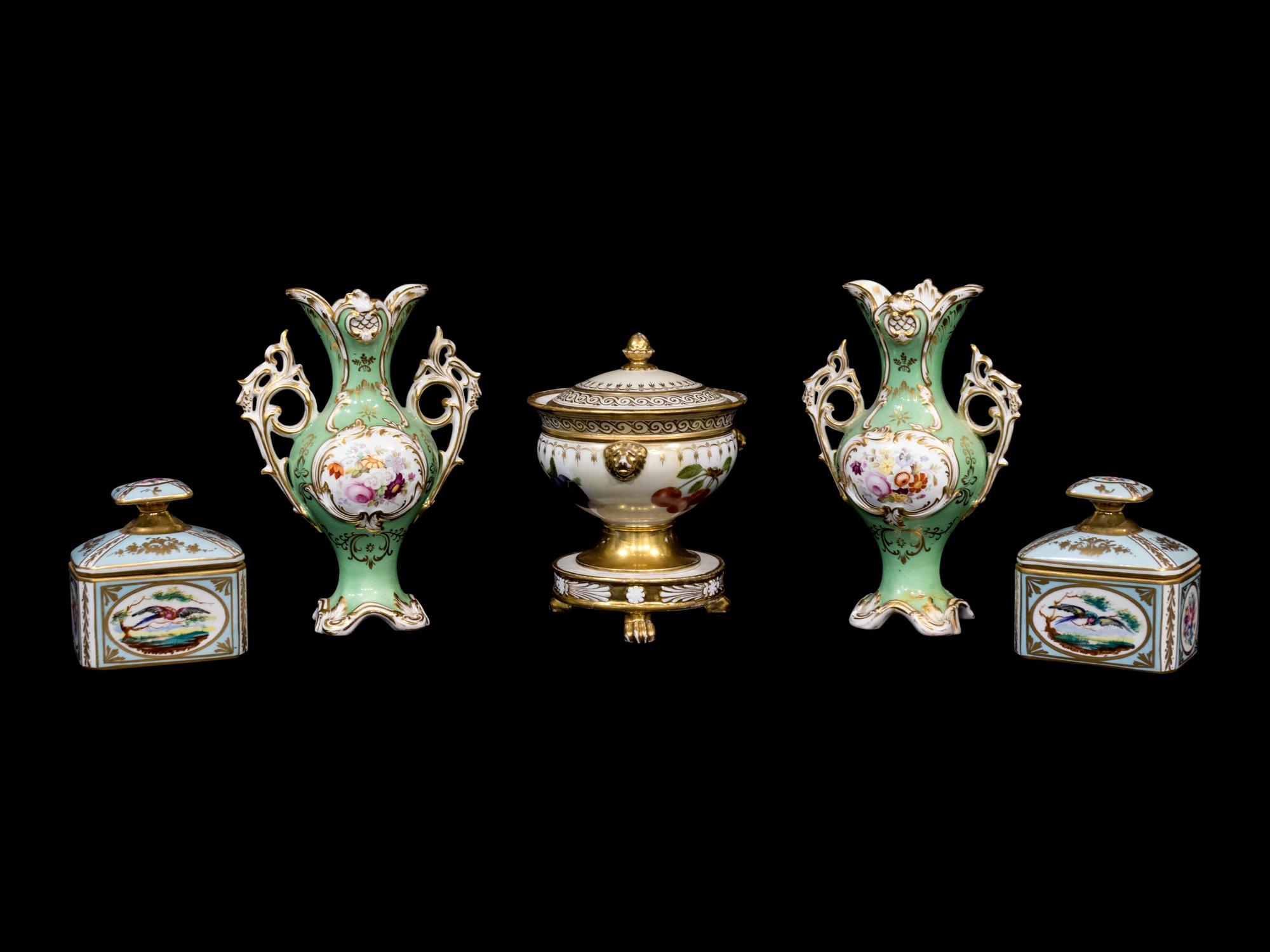 A Pair of Paris Porcelain Two-Handled Vases, A Pair of French Porcelain Toilette Bottles and a Paris Porcelain Footed Sauce Tureen