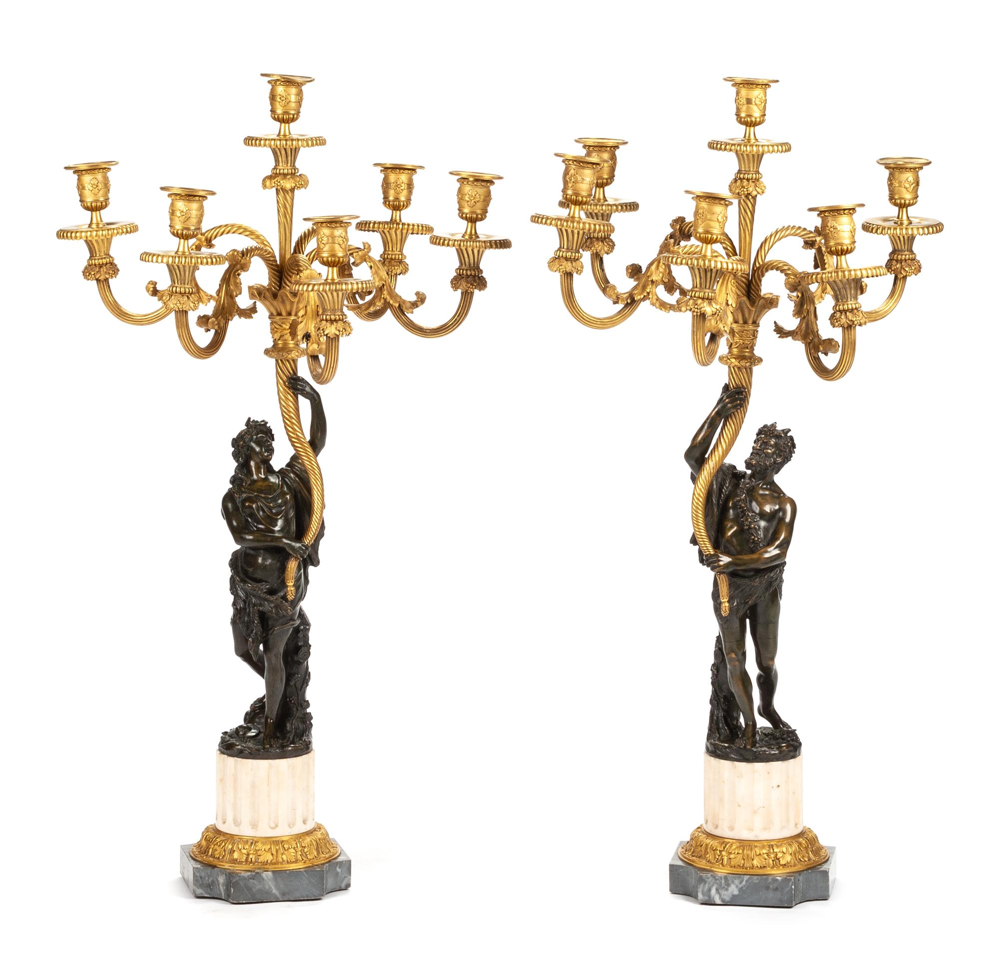 A Pair of Louis XVI Style Gilt and Patinated Bronze Six-Light Figural Candelabra Height 33 3/4 inches. — LATE 19TH/EARLY 20TH CENTURY