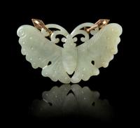 A Celadon Jade 'Butterfly'-Form Pendant