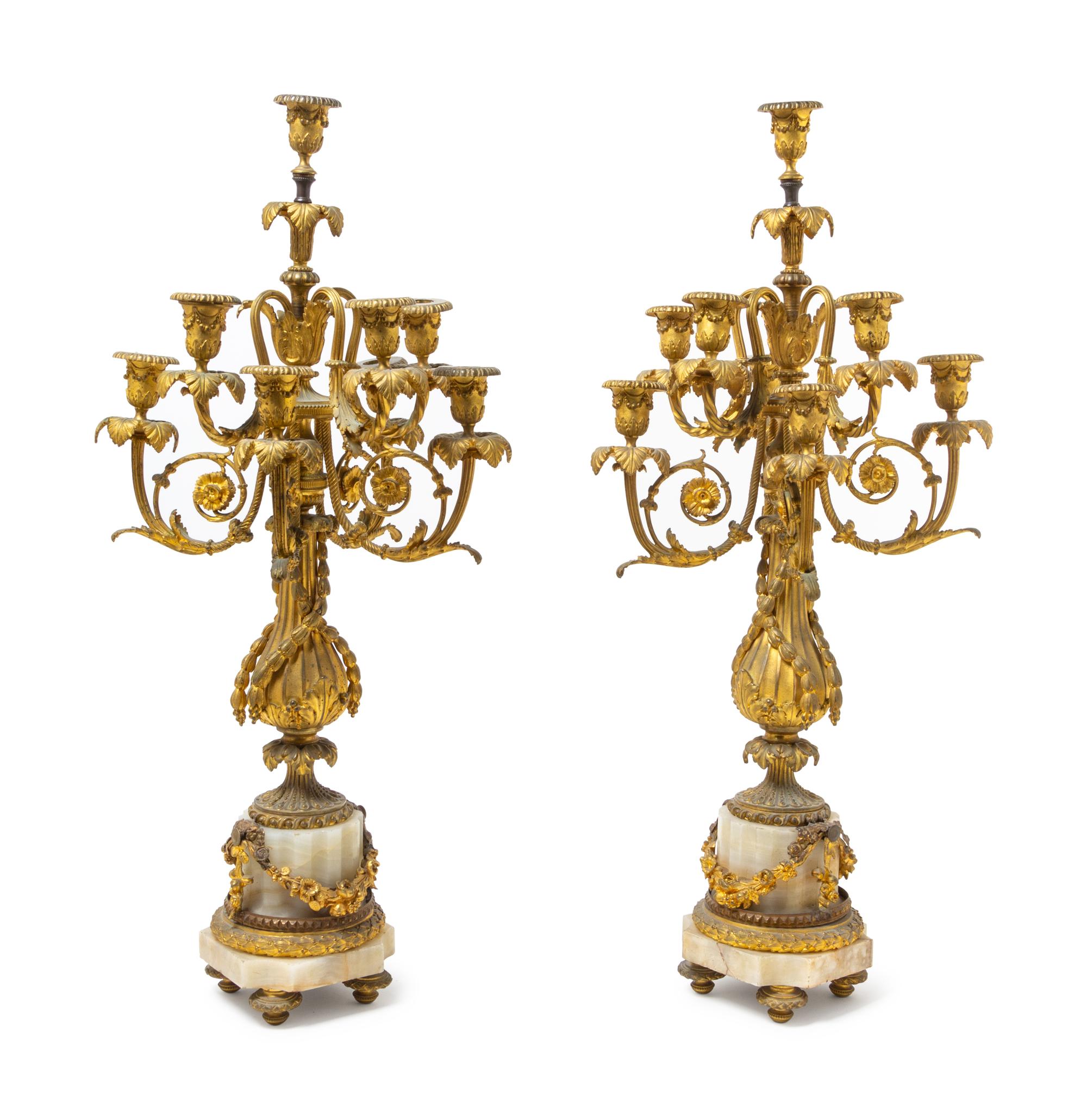 A Pair of Louis XVI Style Gilt Bronze and Onyx Eight-Light Candelabra