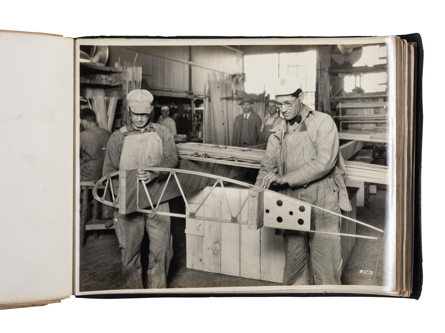 [AVIATION]. SMITH, Edgar B. (1896-1966), photographer. Rare photographic salesman aviation album documenting various airplanes and their construction at the plant of the Travel Air Manufacturing Company of Wichita, Kansas. Ca 1929.