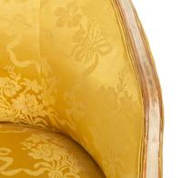 A Louis XV Style Painted and Parcel Gilt Barrel Back Bergere