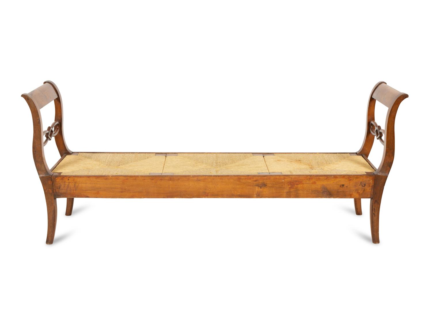 A Northern European Carved Walnut Bench with Rush Seat