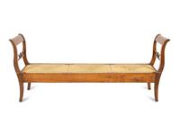 A Northern European Carved Walnut Bench with Rush Seat