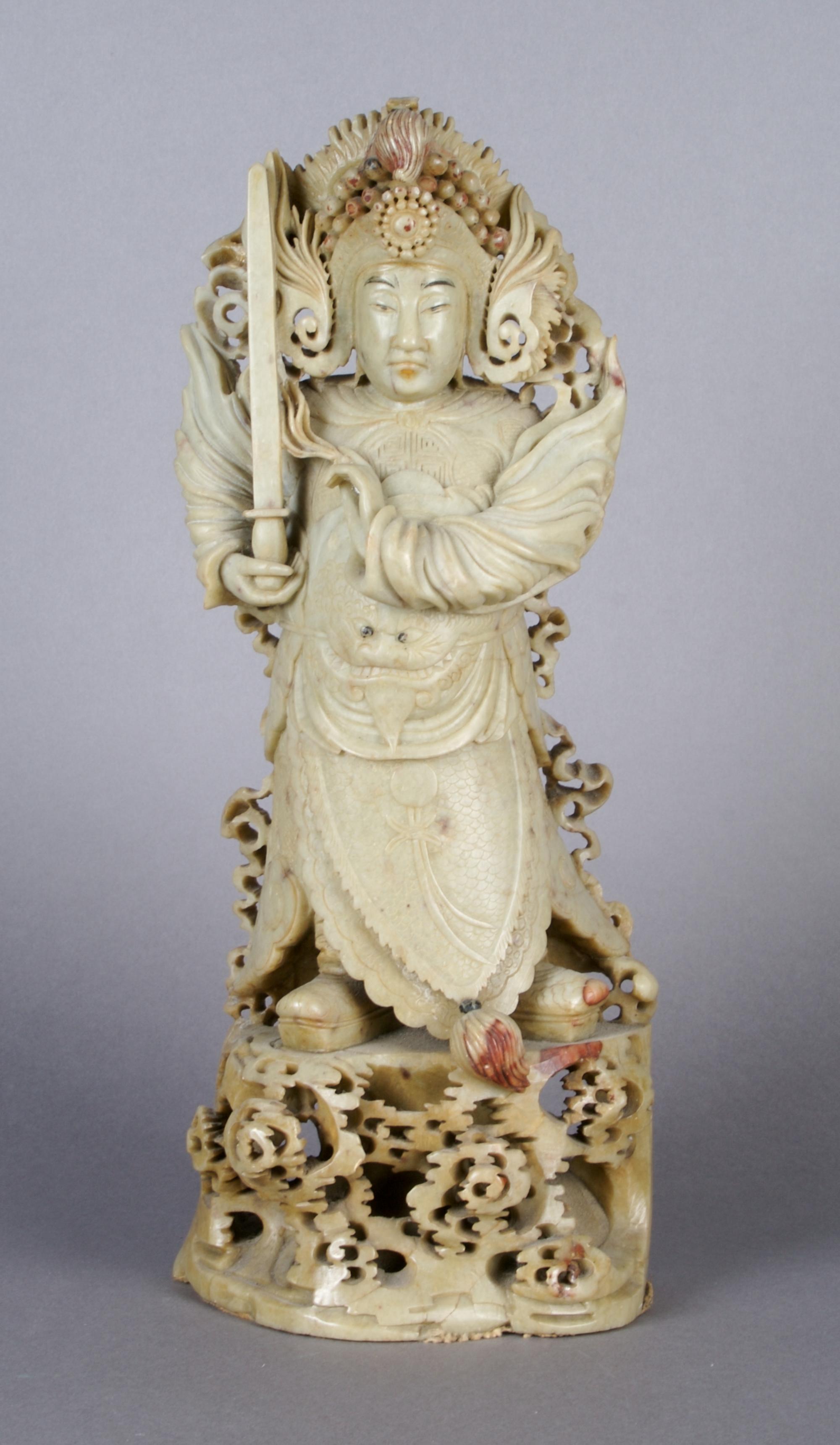 A Chinese Carved Soap Stone Figure, Height 12 3/4 inches.