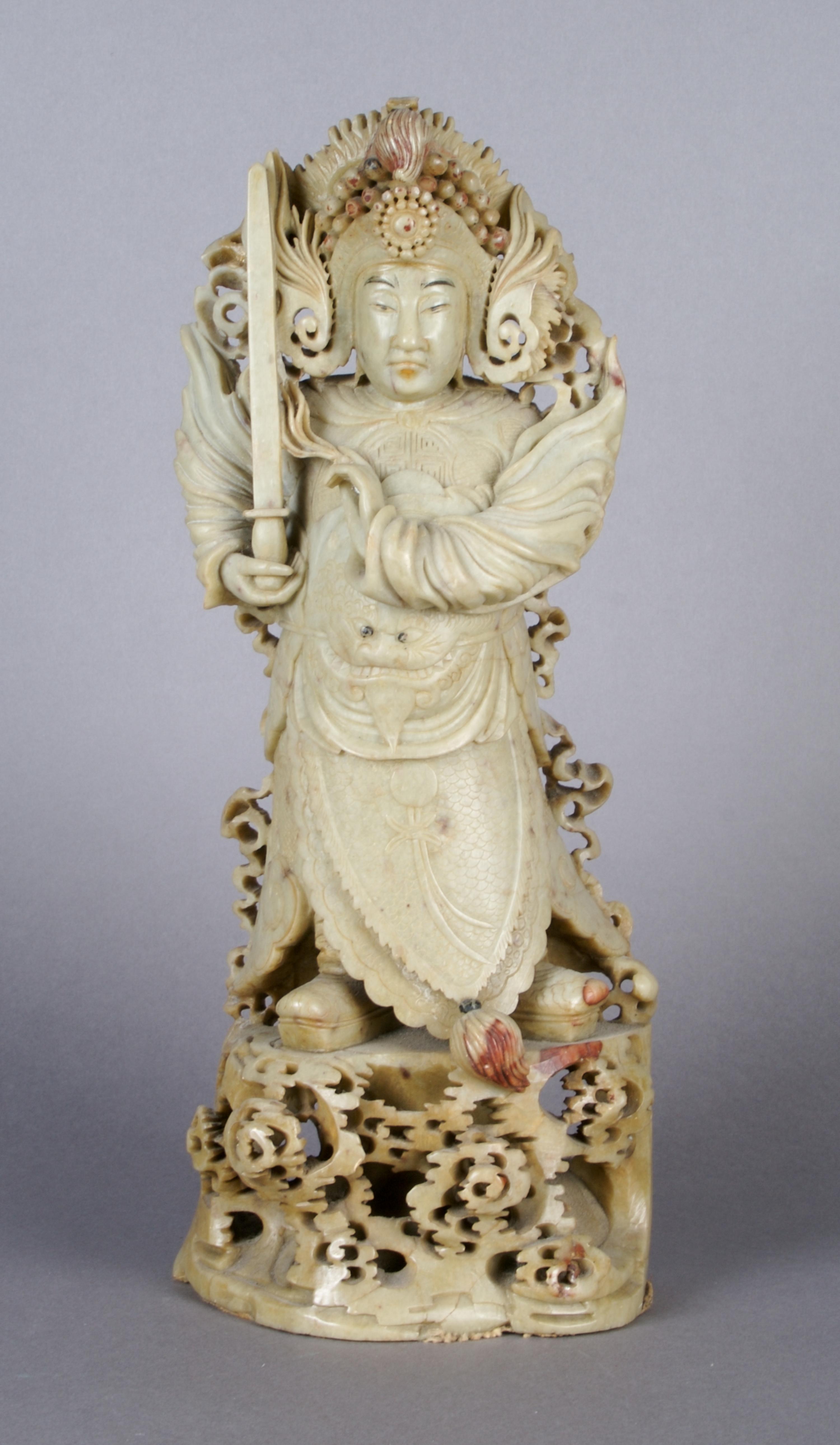 A Chinese Carved Soap Stone Figure, Height 12 3/4 inches.