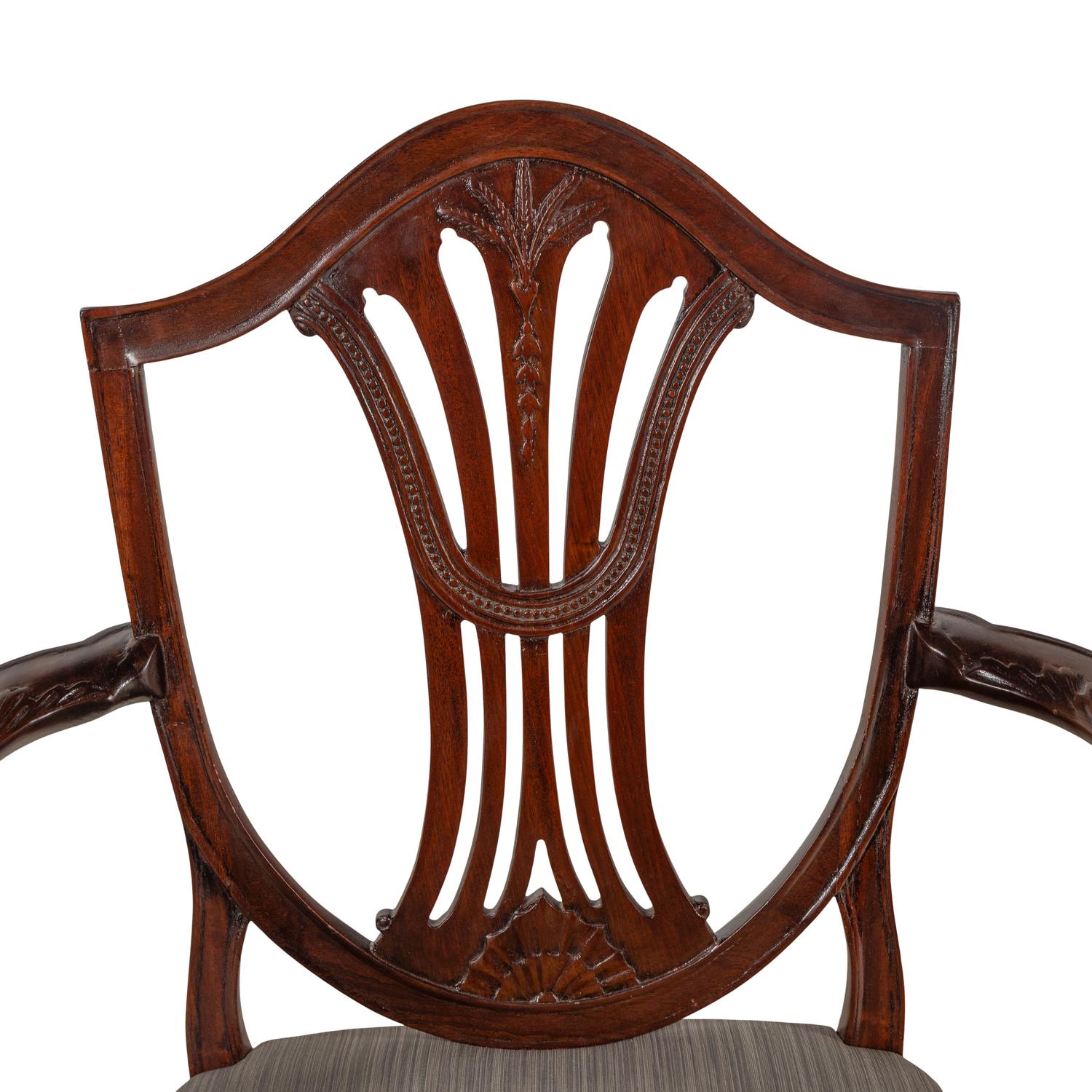A Pair of George III Mahogany Armchairs
