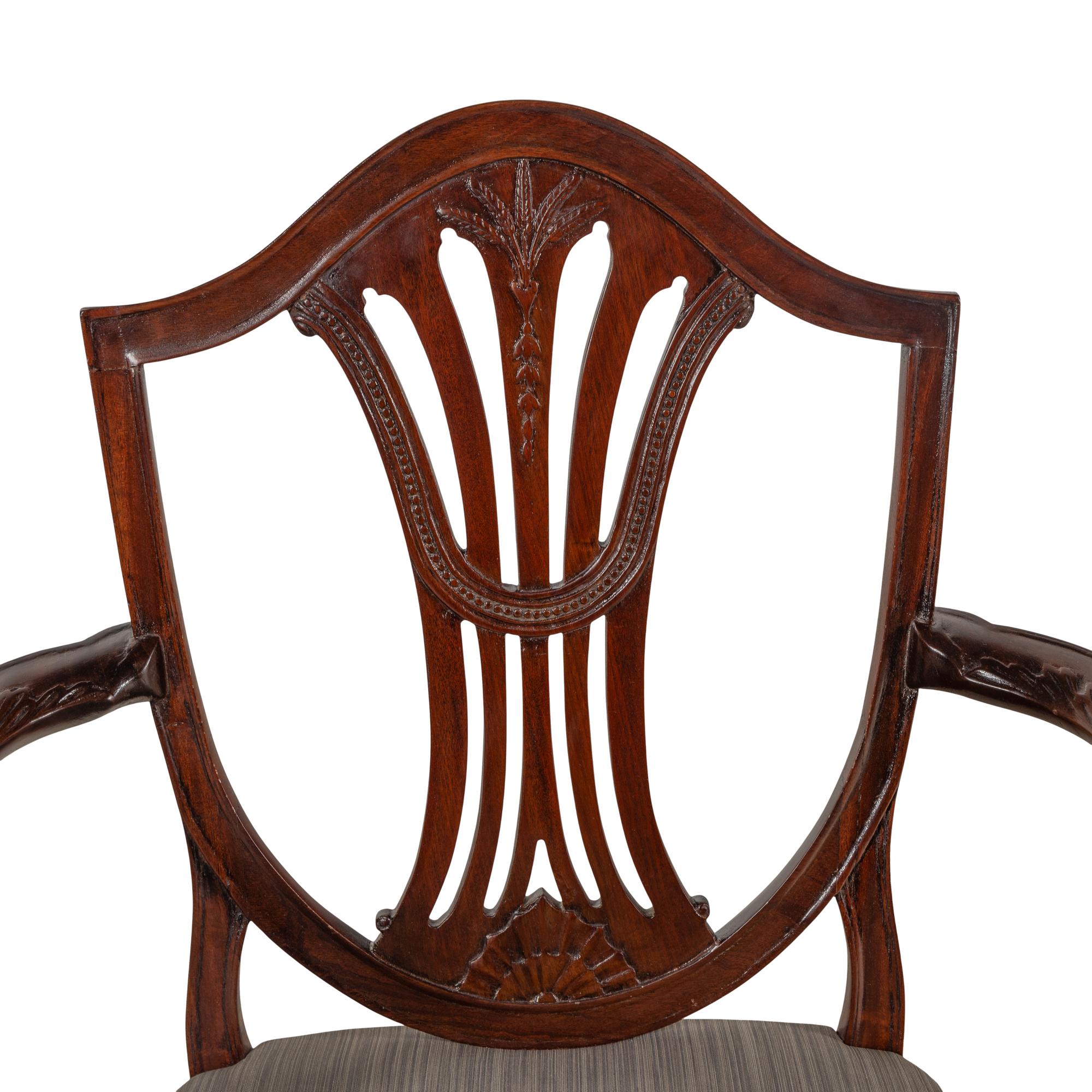 A Pair of George III Mahogany Armchairs