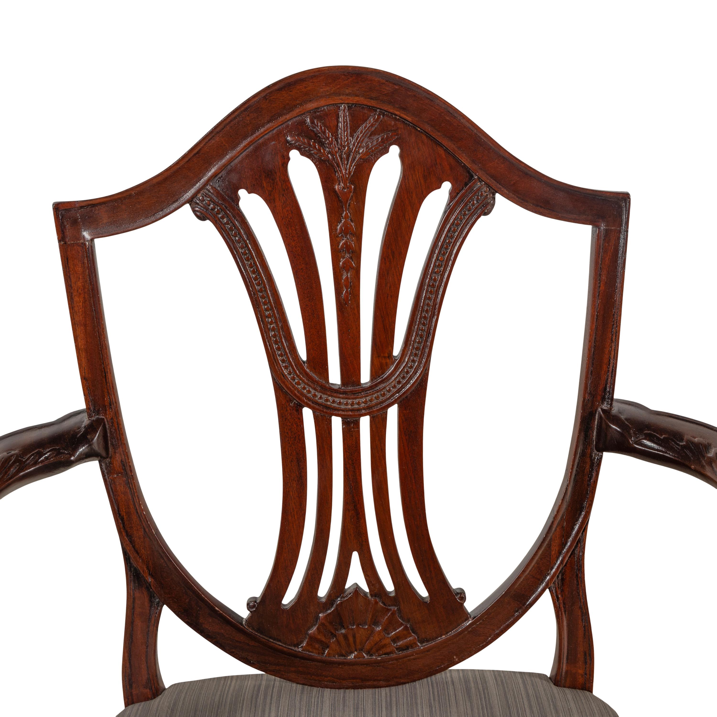 A Pair of George III Mahogany Armchairs