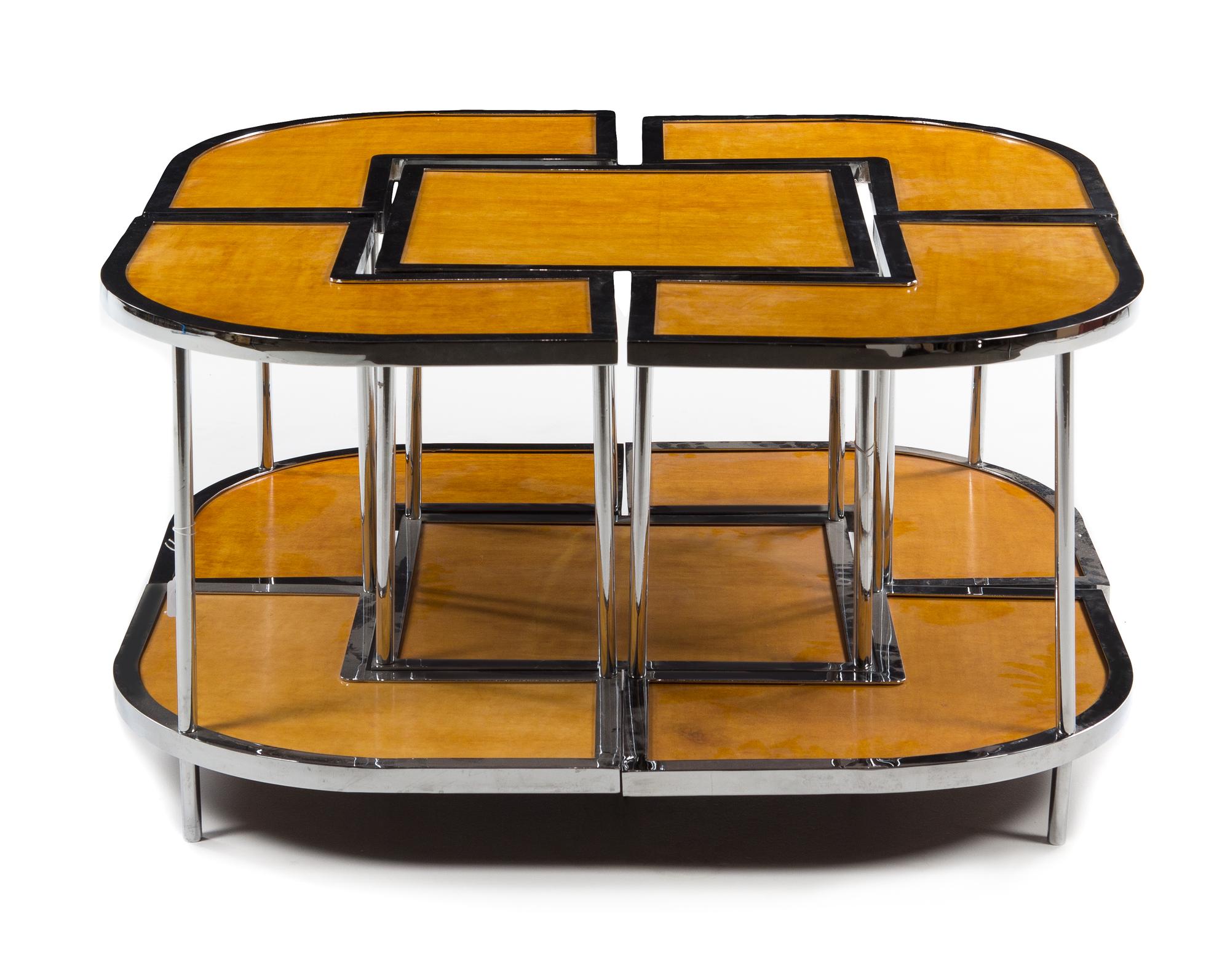 An Art Deco Maple and Chrome Sectional Coffee Table Height 20 1/2 x width 41 1/4 x depth 41 1/4 inches