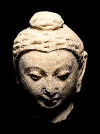 Four Gandharan Fragmentary Stucco Heads and One Bust