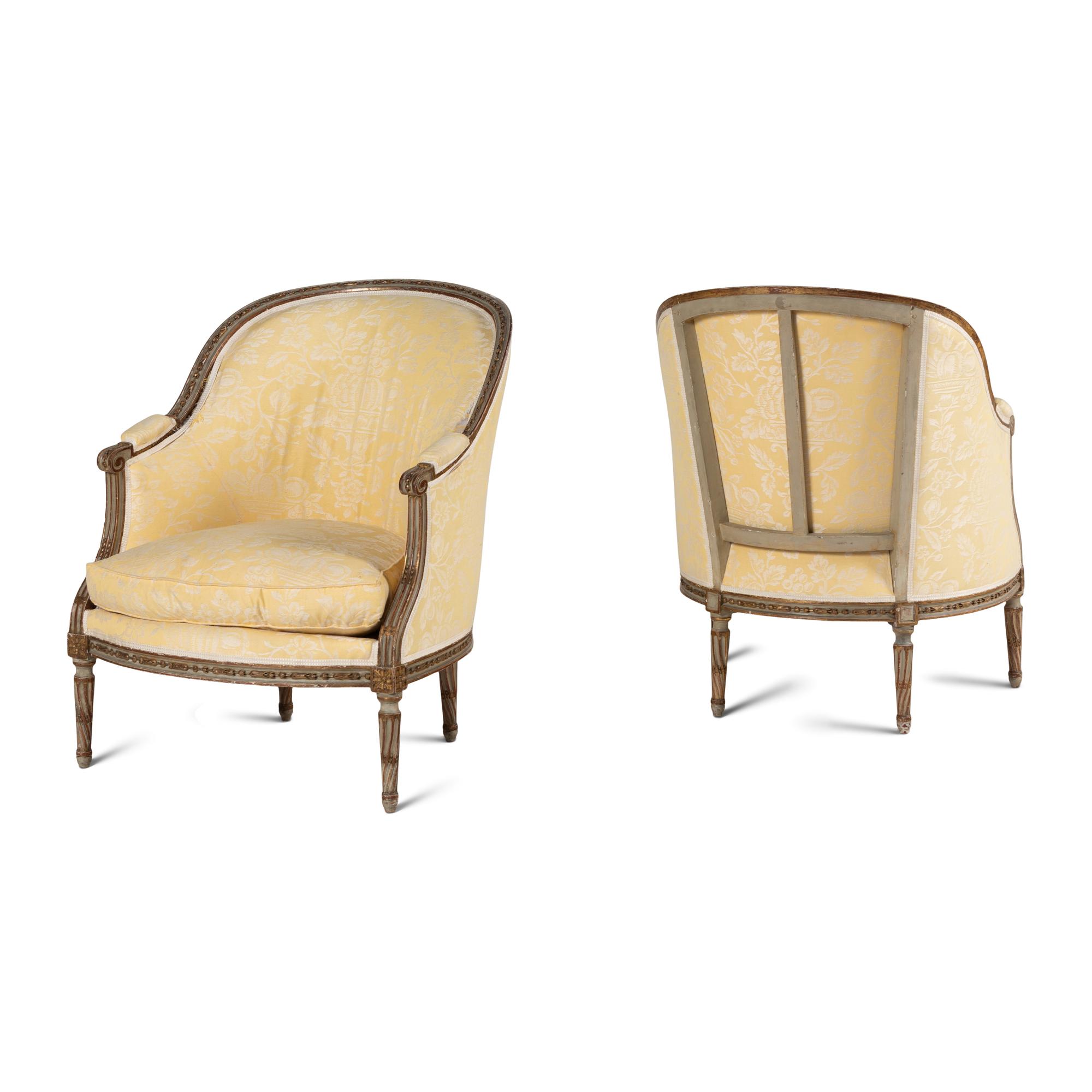 A Pair of Louis XVI Painted and Parcel Gilt Bergères