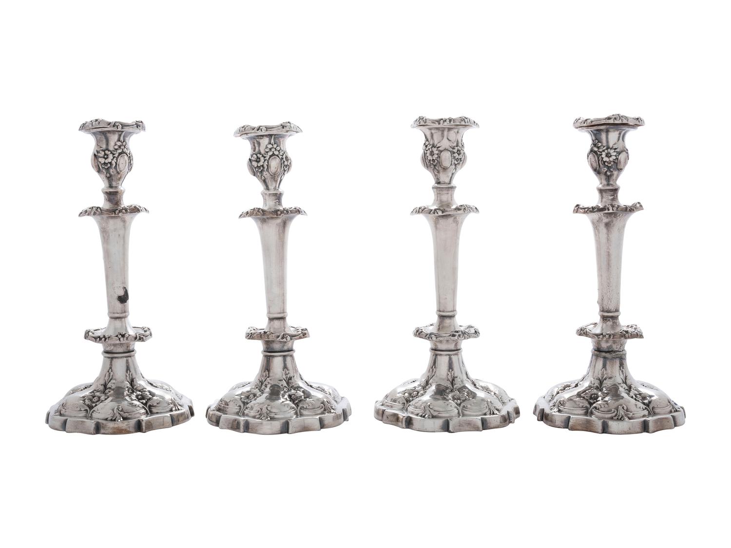 Four Silverplated Weighted Candlesticks and a Silverplated Tray