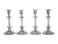 Four Silverplated Weighted Candlesticks and a Silverplated Tray