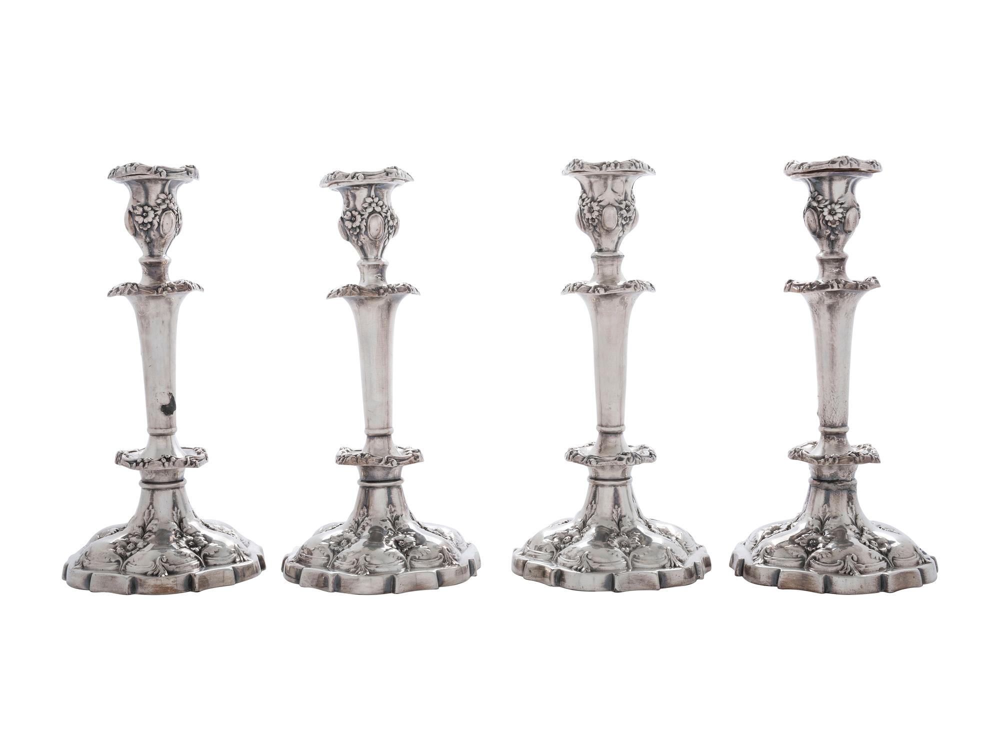 Four Silverplated Weighted Candlesticks and a Silverplated Tray
