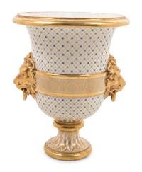 A French Parcel Gilt Porcelain Wine Cooler