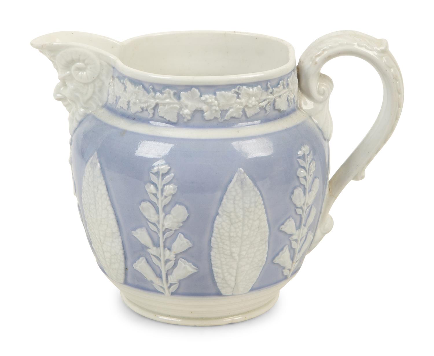 A Collection of Eight English Salt Glazed Relief Form Pitchers and Molded Earthenware — 19TH CENTURY