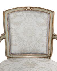 A Pair of Italian Neoclassical Painted and Parcel-Gilt Armchairs