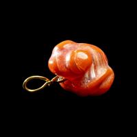 A Costa Rican Carnelian Zoomorphic Pendant
