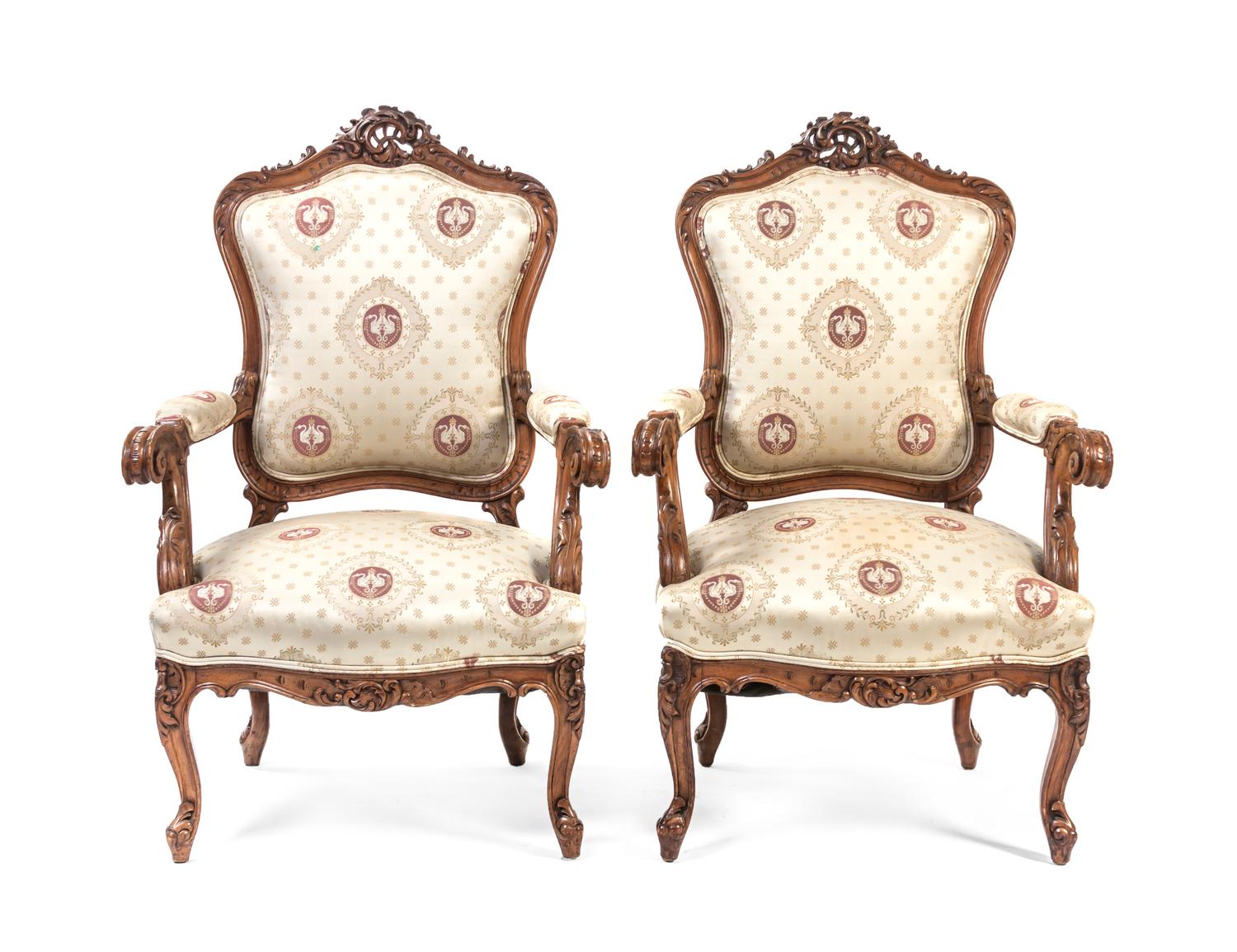 A Pair of Louis XV Style Walnut Fauteuils, Height 40 inches.
