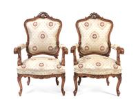 A Pair of Louis XV Style Walnut Fauteuils, Height 40 inches.