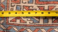 Two Caucasian Style Rugs