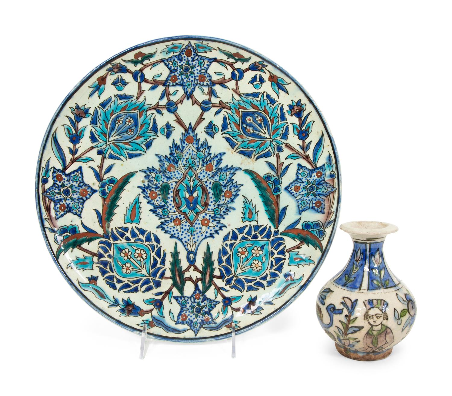 An Islamic Iznik Glazed Pottery Plate and a Small Vase