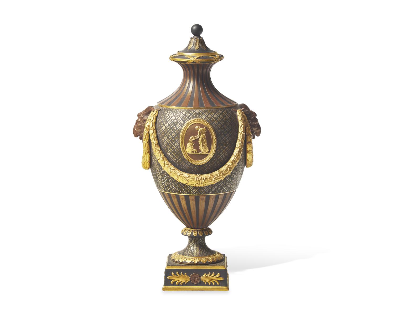 A Wedgwood Brown Glazed and Parcel Gilt Black Basalt Covered Urn
