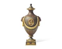 A Wedgwood Brown Glazed and Parcel Gilt Black Basalt Covered Urn