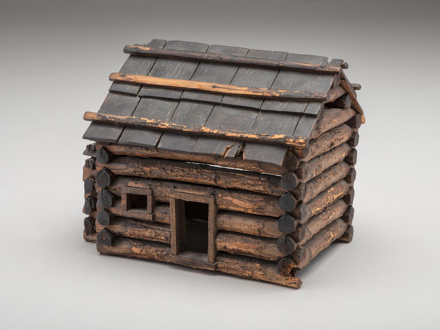 [LINCOLN, Abraham (1809-1865)]. Folk art log cabin depicting Abraham Lincoln's birthplace.