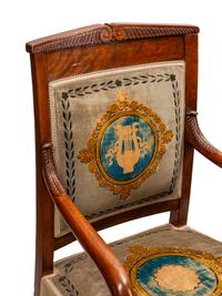 A Set of Eight Louis Philippe Carved Mahogany Armchairs