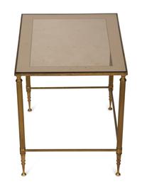 A Set of Three Gilt Metal Nesting Tables in the Style of Maison Jansen